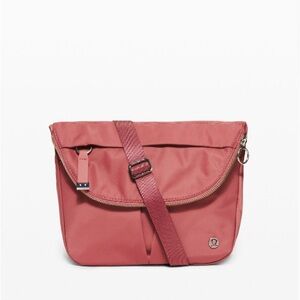 lululemon athletica Pink Crossbody Bag with Adjustable Strap and Flap Closure